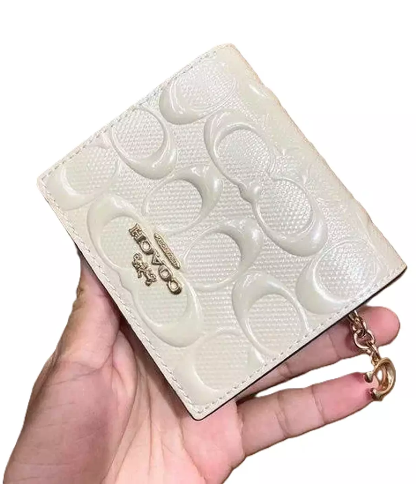 Snap Wallet In Signature Canvas leather glossy white