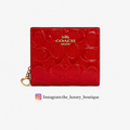 Snap Wallet In Signature Canvas leather glossy red