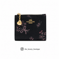 Coach bifold wallet black with purple flowers