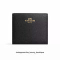 Coach snap wallet in black