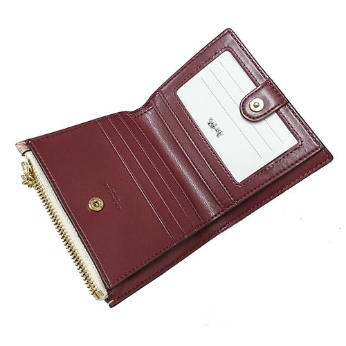 Coach bifold wallet with butterflies