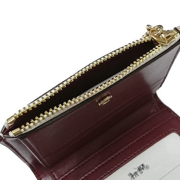 Coach bifold wallet with butterflies