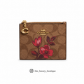 Coach bifold wallet light brown with pinkish flowers