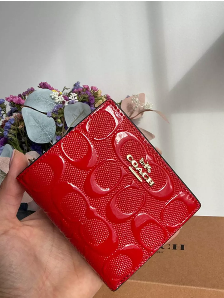Snap Wallet In Signature Canvas leather glossy red